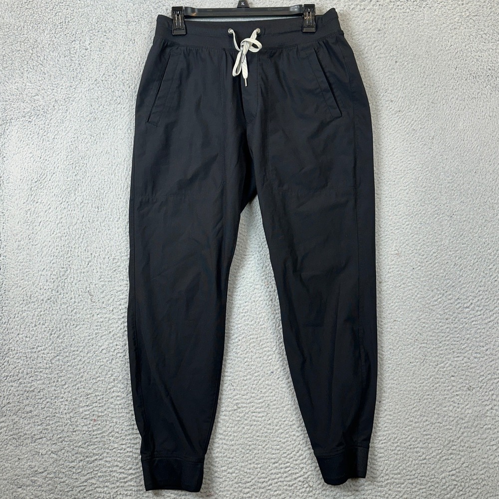Vuori Joggers Mens Medium Black Performance Tapered Athletic Drawstring Logo EUC